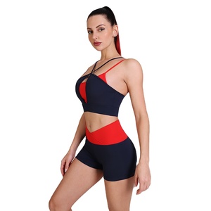 Conjunto de yoga de 2 piezas para mujer, pantalones cortos de cintura alta con bloques de color y sujetador deportivo cruzado, ropa deportiva para gimnasio - Product Image 2
