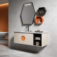 Armoire de salle de bain au design hexagonal finition mate avec miroir intégré et rangement dissimulé, miroir rétroéclairé par LED