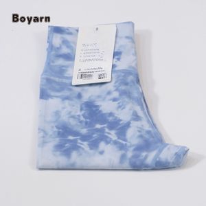 Leggings de yoga taille haute à neuf points pour femmes pantalons de sport élastiques à séchage rapide pour la course et le fitness Tie Dye Design - Product Image 4