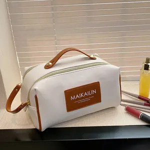 The New Cosmetic Bag High-end Women's Toilet Hand In Hand Large-capacity Travel Storage Skin Care Products Toiletry Bag