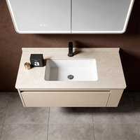 Meuble-lavabo mural flottant minimaliste sans poignées avec miroir LED et système de fermeture douce
