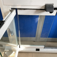 Sistema de balcón de calidad con cerradura lateral Puerta de vidrio plegable apilable deslizante sin marco