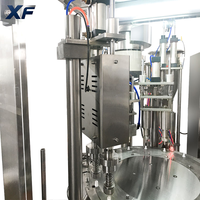 Machine de remplissage et de bouchage rotative XF entièrement automatique à double entraînement contrôlée par PLC pour sachets à bec verseur, remplisseuse de liquides et de pâtes Doypack