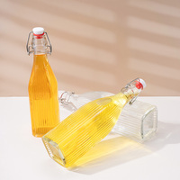 Bouteilles en verre carrées transparentes en gros 500ml 750ml 1000ml avec bouchons roll-on et agitateurs pour la fermentation du kombucha