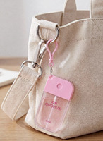Flacon pulvérisateur portable transparent rose 40 ml, peut servir de breloque de sac pour parfum, eau hydratante pour le visage, pour les soins personnels.
