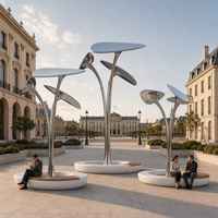Installation d'art public moderne, grande sculpture abstraite en acier inoxydable en forme de feuille d'arbre pour parc urbain, place en bordure de mer