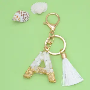 Popular Gold Glitter Gradient Resin Letter Key Chain With White Tassel Fashion Girls A-Z Alphabet Keychain Bag Pendant Ornaments