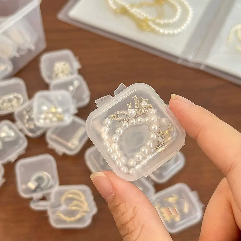 Pequeña caja de plástico transparente para joyería, anillo, pendiente, disco en U, tarjeta de teléfono móvil y almacenamiento de tapones para los oídos