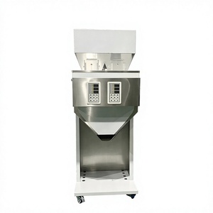 Máquina llenadora de gránulos semiautomática de doble cabezal para el llenado de dulces, frutos secos y granos. - Product Image 1