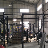 Rack de musculation multifonction tout-en-un pour usage commercial en salle de sport, avec banc de musculation, pour press, squats et entraînement fonctionnel libre
