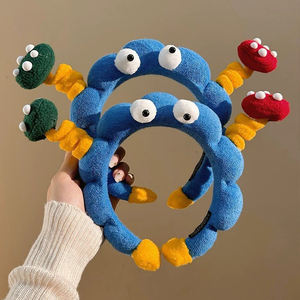 Serre-tête en éponge OEM mignon et amusant, avec grandes <span class=keywords><strong>yeux</strong></span> en peluche colorés, pour le lavage du visage, pour femmes et filles - Product Image 4