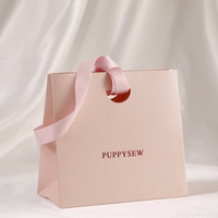 Ventes chaudes Sac à main en papier de qualité supérieure Couleur rose Ensemble d'emballage de bijoux avec sac et boîte Fabrication de sacs en papier personnalisés