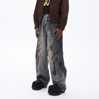 Pantalon en jean délavé tie-dye coloré à jambe large, style rétro graffiti fait main, inspiré de la mode urbaine américaine pour homme