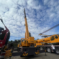 Grue de chantier d'occasion 70 tonnes, robuste et bien entretenue, avec moteur Weichai National III, pompe et moteur, quatre essieux, pour levage de charges lourdes
