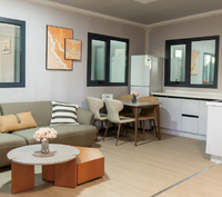 Maison conteneur extensible durable en panneaux sandwich de 20 à 40 pieds, alimentée à l'énergie solaire, pour logement temporaire, fabricant chinois OEM ODM