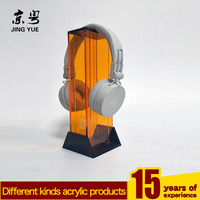 Présentoir moderne personnalisé en acrylique PMMA noir orange sans fil pour casque Bluetooth Support écologique pour casque d'écoute