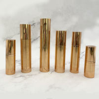 Flacon cosmétique sans air en plastique doré brossé personnalisé pour sérum et lotion, 50ml/100ml, avec pompe sans air, emballage sous vide
