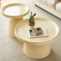 Table basse ronde en fer forgé, design moderne et minimaliste, combinaison de formes champignon en noir et blanc, pour salon