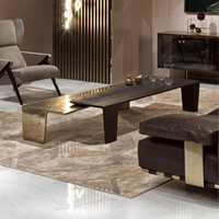 Table basse Vintage en acier inoxydable, or et métal noir irrégulier, style Vintage exotique