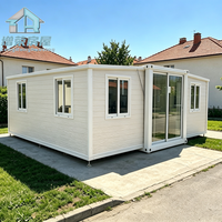 Maison conteneur pliable Zero Foundation de 20 pieds, unité modulaire préfabriquée extensible à construction rapide pour usage temporaire comme logement secondaire