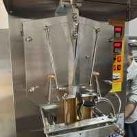 Machine d'emballage verticale automatique pour sachets d'eau pure, machine de remplissage et de scellage de liquides pour jus, lait, shampoing
