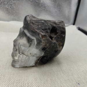 Wholesale Hot <strong>Sale</strong> Natural Green Phantom Skull Statue <strong>White</strong> <strong>Crystal</strong> Carving Hand-carved Skull Carving For Gift