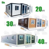 Maison conteneur extensible moderne à toit plat de 30 pieds, panneaux crème, préfabriquée avec mur en verre pour studio de jardin minimaliste