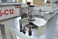 Router CNC de un solo husillo de 9kW, 1300x2500mm, con mesa de vacío y magazín ATC de 12 herramientas tipo disco para madera y metal