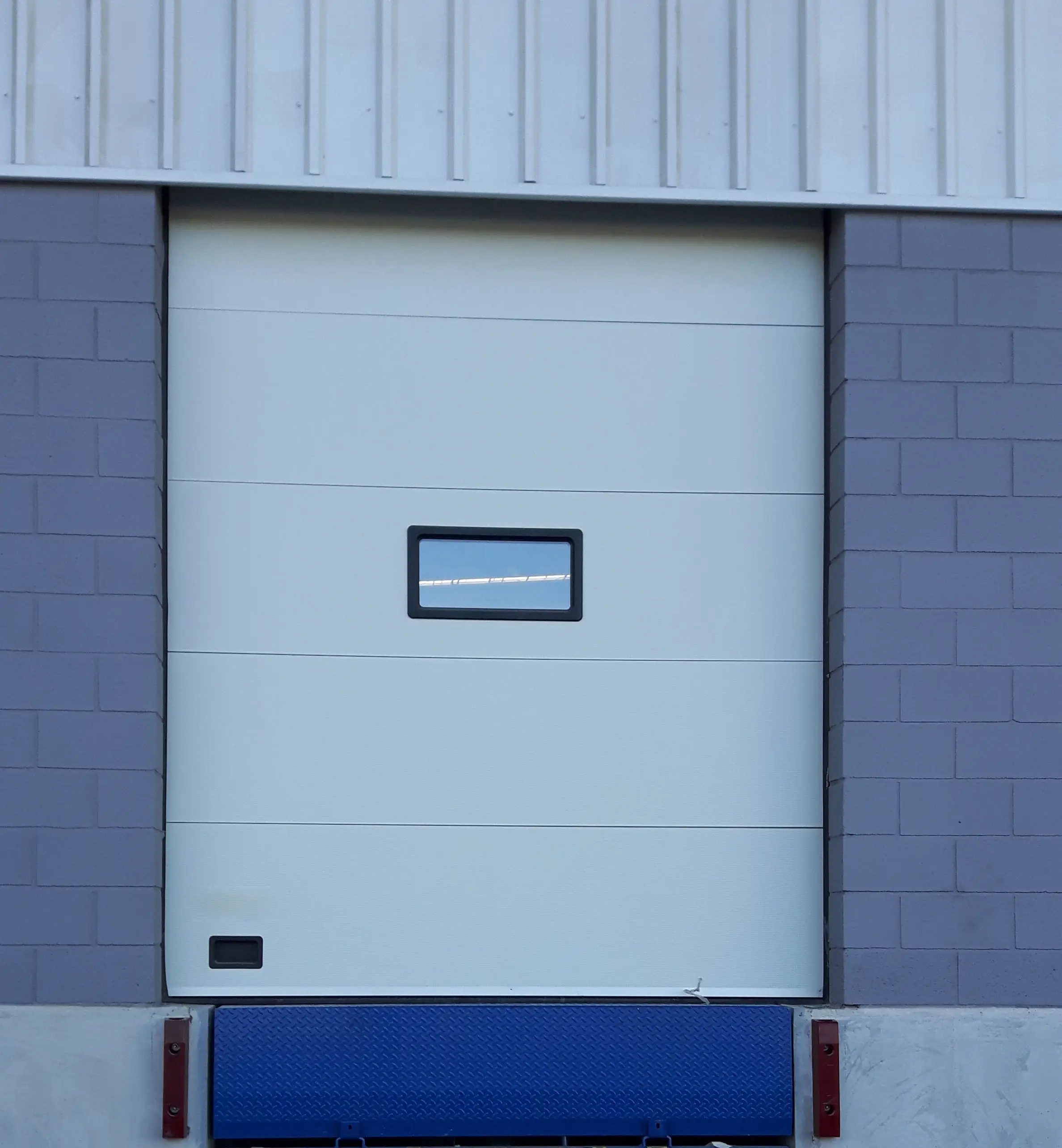 Factory direct sale commercial sandwich PU foam insulated sectional industrial doors