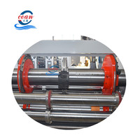 Machine à rainurer rotative automatique pour boîtes en carton ondulé avec emballage en carton