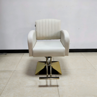 Fauteuil de coiffure hydraulique Ivoire avec base dorée et dossier cannelé – Mobilier de salon de coiffure en gros