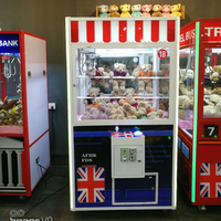Machine d'arcade à griffes économique à monnayeur avec griffe de grue et accepteur de billets pour cadeaux en peluche et jeux d'intérieur