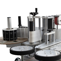 Machine de dépose automatique pour bouteilles rondes, étiquettes adhésives, format bureau