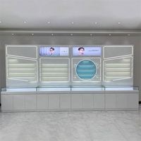 Vitrine d'exposition pliable blanche moderne pour lunettes de soleil et optiques avec petit support pour comptoir de vente au détail