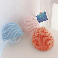Caramelo Color sólido neón a granel de alta calidad personalizado etiqueta privada Oem bebé invierno niños sombrero niños colorido gorro de punto