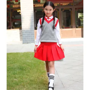 कस्टम नारंगी स्कूल वर्दी शर्ट और स्कर्ट लड़कियों स्कर्ट पोशाक बाल विहार के लिए प्राथमिक छात्रों को स्कूल वर्दी