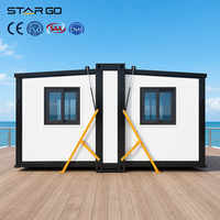 Maison conteneur pliable et extensible à double aile de 10 pieds, haute résistance au vent, avec 1 chambre et douche séparée, type cabine-garde-garage