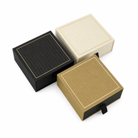 Boîte à bijoux personnalisée noire avec rayures or ivoire, emballage coulissant avec bordure pour cadeaux de détail, marques de cadeaux en gros