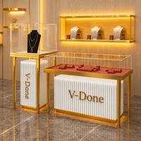 Vitrine de luxe V-Done pour bijoux, en acier inoxydable doré et verre, comptoir d'exposition commercial pour bijouterie