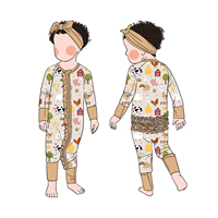 Le nouveau pyjama une pièce plissé pour bébé peut être personnalisé avec un tissu en bambou imprimé à motifs, adapté au printemps et à l'automne