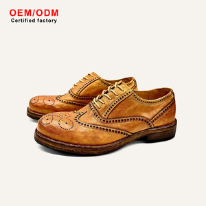 รองเท้าหนังม้าพรีเมียมแบบ Brogue แต่ง Wingtip ประดับเหรียญที่หัวรองเท้า แบบผูกเชือก พื้นรองเท้าเย็บแบบ Goodyear สีคอนยัค สไตล์วินเทจ ดีไซน์เนอร์ - Product Image 1