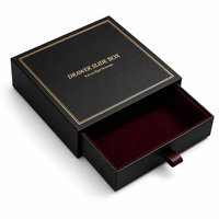 Boîte cadeau noire rigide à tiroir coulissant avec logo personnalisé, cadre doré et doublure floquée rouge bordeaux pour fournisseur d'emballages de bijoux