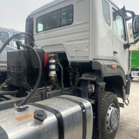 Camion tracteur d'occasion Sinotruk Howo NX 6x4 400 CV, conduite à gauche, diesel robuste pour le transport logistique, unité tractrice 430 CV