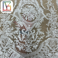 Nouvelle Arrivée Tissu en Dentelle Française Tissu Brodé de Paillettes Tissu en Dentelle Guipure Tissu en Dentelle Cordonnée Tissu en Maille pour Robes de Mariée Blanches