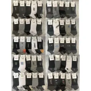 Cheap Pure Color White Black Nice Package Adult Men Women Socks Wholesale For Stall Selling