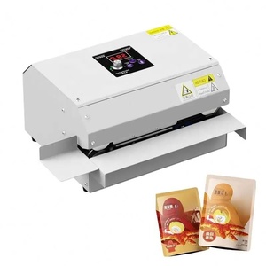 Machine de scellage thermique semi-automatique à haute vitesse pour l'emballage des boissons, pour les sacs en plastique et les boîtes alimentaires en aluminium - Product Image 1