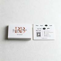 Stampa di biglietti da visita di lusso con stampa offset su carta patinata e laminazione in film