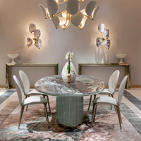 Table à manger moderne de luxe italienne avec plateau en marbre naturel ovale et piétement cannelé pour villa et maison