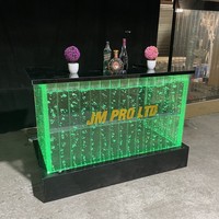 Comptoir de bar moderne en acrylique en forme de L avec éclairage LED RGB multifonctionnel pour hôtel, salon et usage commercial