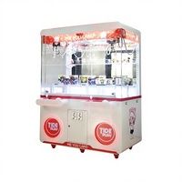 Vente en gros usine : Grande machine à griffes de type distributeur de peluches, 1 joueur, construction métal et plastique, compatible 110V/220V